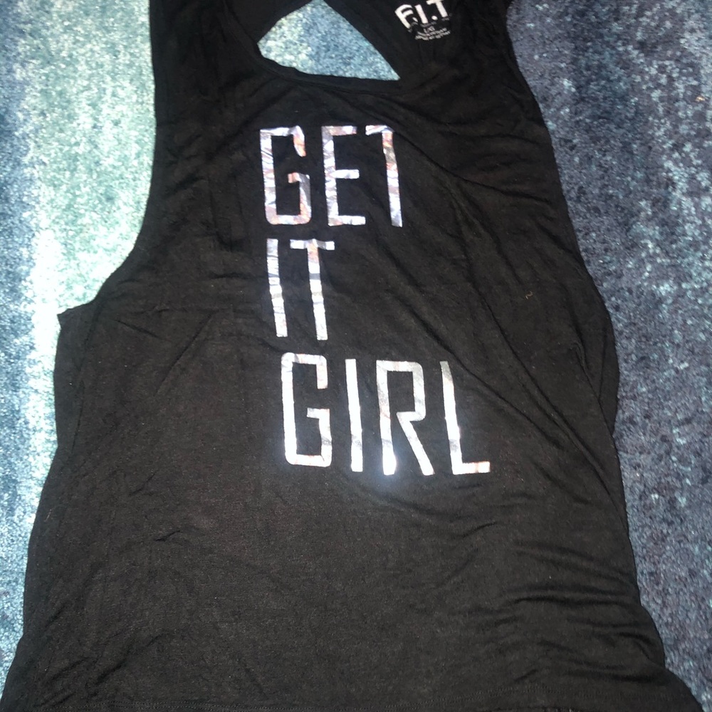 A black workout top with an open back
